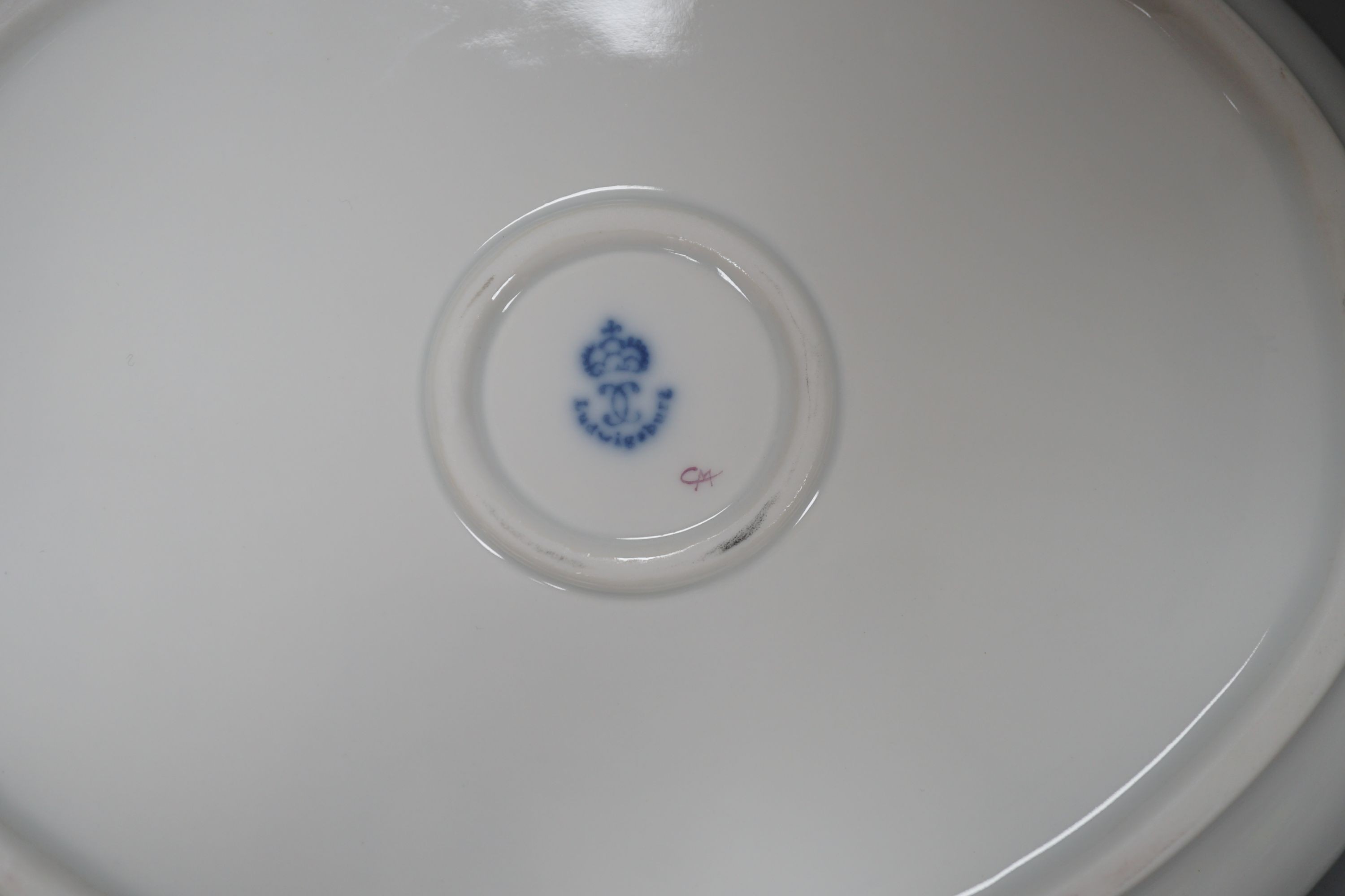 A Ludwigsburg oval fruit painted dish and four Rosenthal Wiinblad plates